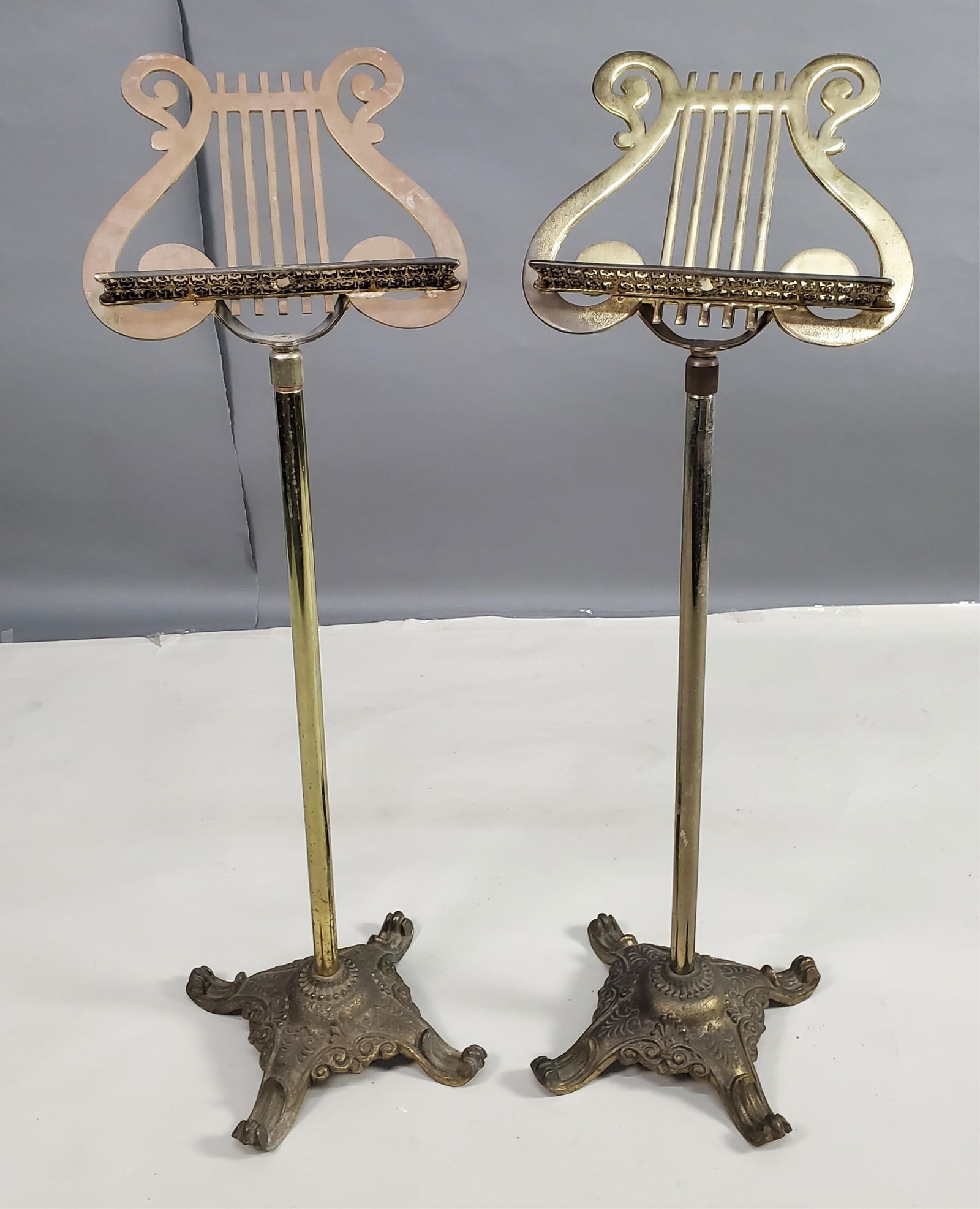 Pair of Vintage Brass Lyre Form Music Stands, one has losses to the plating, 39 1/4" h. 13" w. (1 of 4)