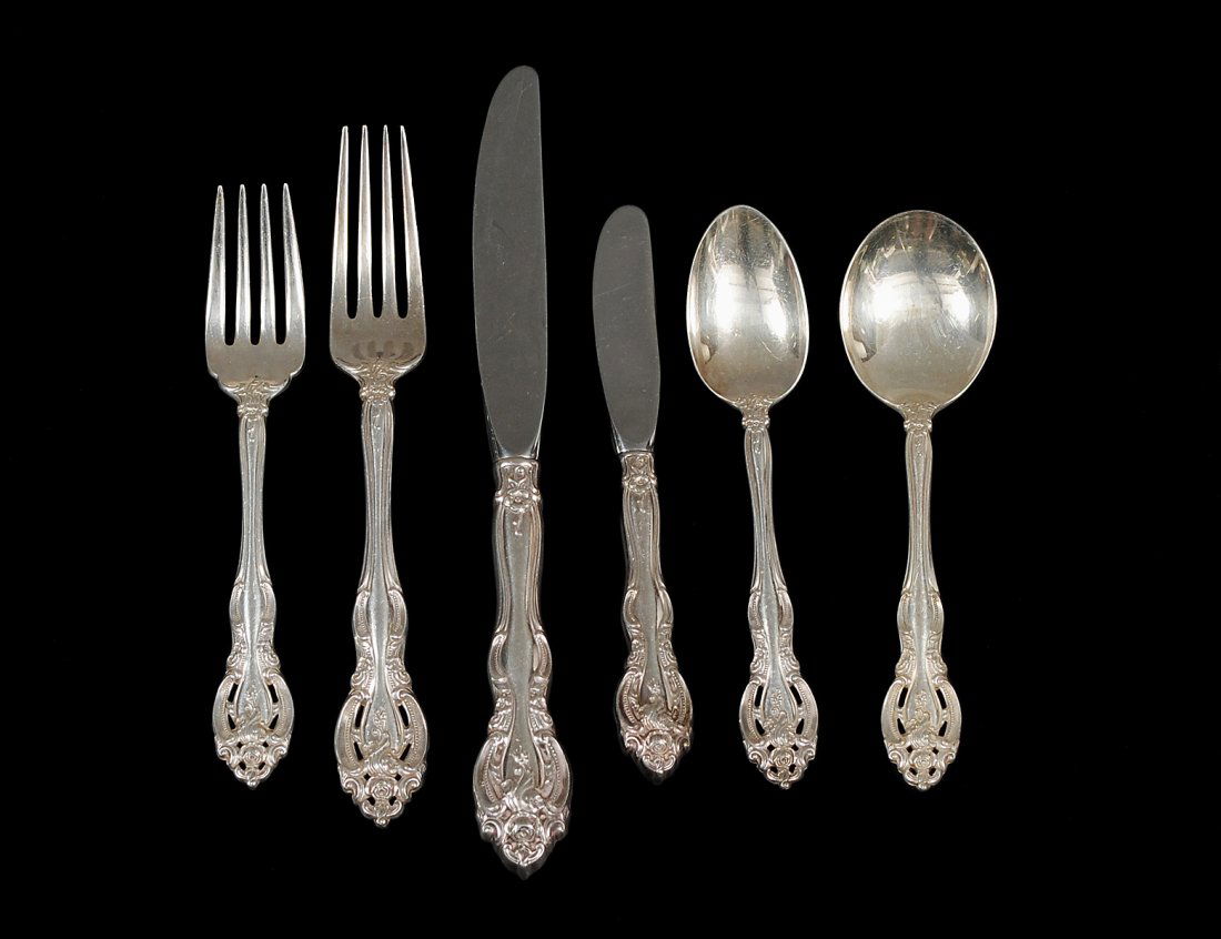 NINETY-SIX PIECE STERLING SILVER FLATWARE SET: American. Maker: Gorham. In the "La Scala" pattern. Comprising: twelve dinner knives, twelve butter knives, twelve dinner forks, twelve luncheon forks, twelve salad forks, twelve soup spoons and twent