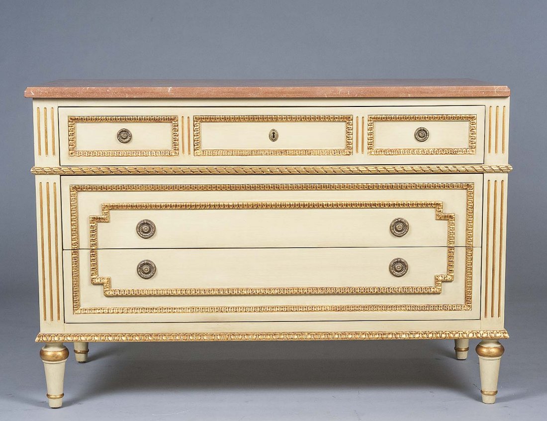 CHARLES X STYLE PAINTED AND PARCEL GILT COMMODE: With rectangular marble top above the case with three long drawers, raised on circular tapered legs. Height 33 ½”. Width 49”. Depth 23 ½”. (300/400)