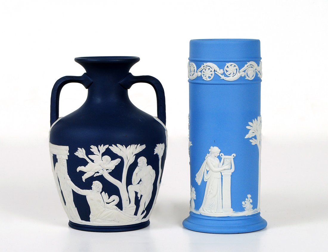 WEDGWOOD JASPER-WARE "PORTLAND" VASE: English. Impressed factory mark. Height 5 3/4". Together with a cylindrical blue and white vase. Height 6 1/2". (2 pcs) (300/400)