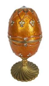 Jay Strongwater Style Enamel, Metal, and Bejeweled Musical Egg, 4 3/4" h. 2 1/8" w. 2 1/4' d.
