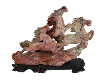 A Chinese Soapstone Carving of a Group of Wild Horses, 8 1/4" h. 11" w. 2 1/2" d., in a conforming