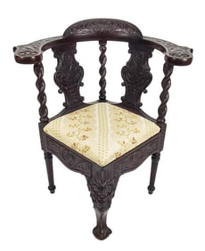 English 19th Century Carved Corner Chair, barley twist supports with fretwork carving and grotesque