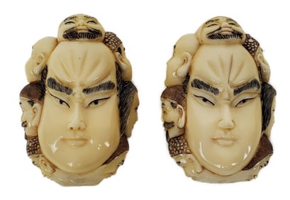 Two Japanese Bone Carvings of Kabuki Masks with head additional carvings, having chop marks, 2 1/8"