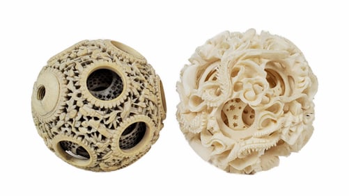Two Chinese Intricately Carved Magic Balls, no stands, one with some damage, largest-8 1/4" dia.