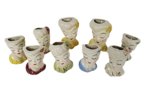 Group of Nine American Vintage Lady Head Vases, 6" h. 4" w.