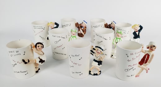 Group of Nine Vintage American Art Deco Jazz Era Pottery Glasses, 4 1/2" h., some minor chips.