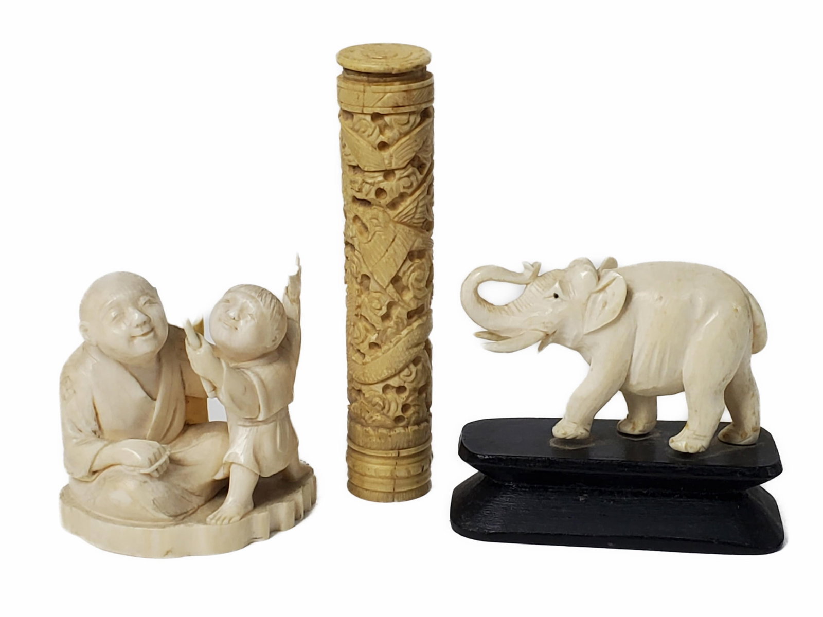 Group of Three Carved Objects, one Japanese group with an Elder and Boy, One an Elephant on stand,: Group of Three Carved Objects, one Japanese group with an Elder and Boy, One an Elephant on stand, and the other a Bone carved and pieced cylinder tube, missing top, Tallest-4 1/8"