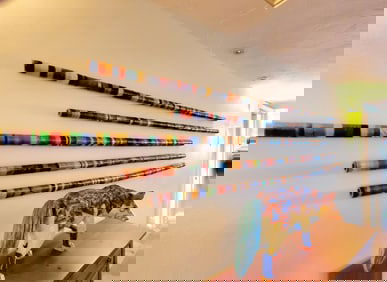 Group of Five Southwest Style Colored Wire Wrapped Long Poles, Longest-95"