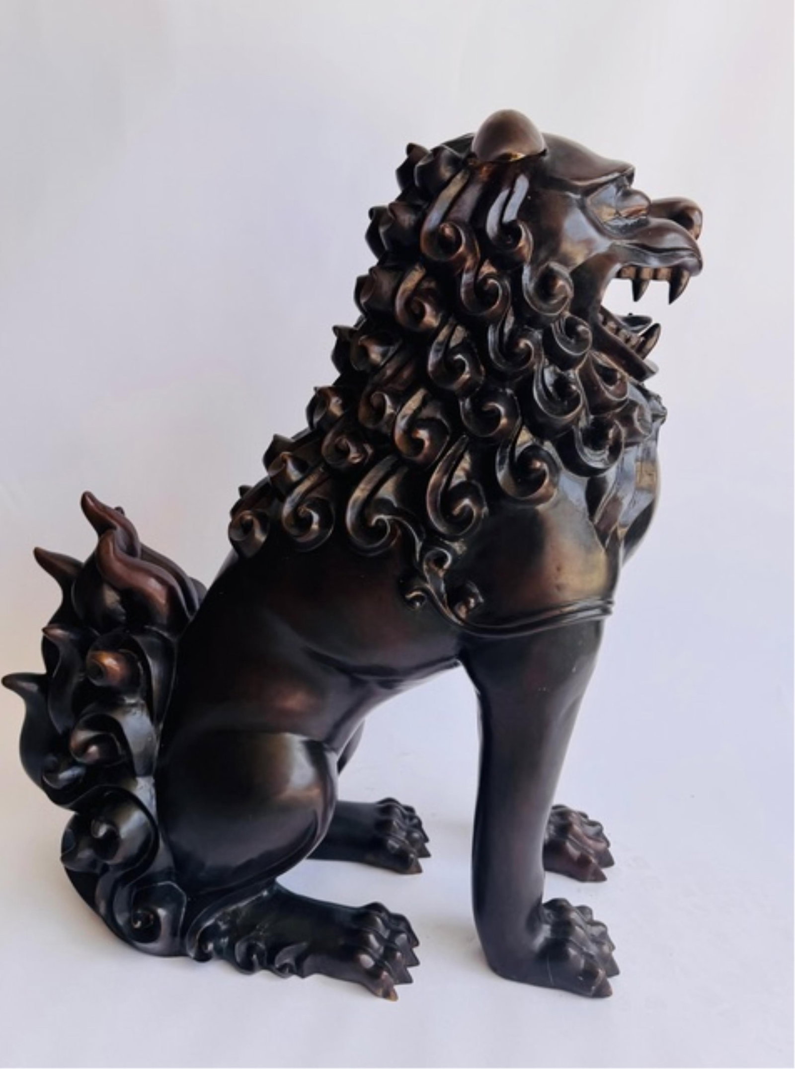 A Life Size Chinese Bronze Guardian Foo Dog, rich patina with crisp casting, about 70-80 years old,: A Life Size Chinese Bronze Guardian Foo Dog, rich patina with crisp casting, about 70-80 years old, 29" h. 26" w. 11" d.