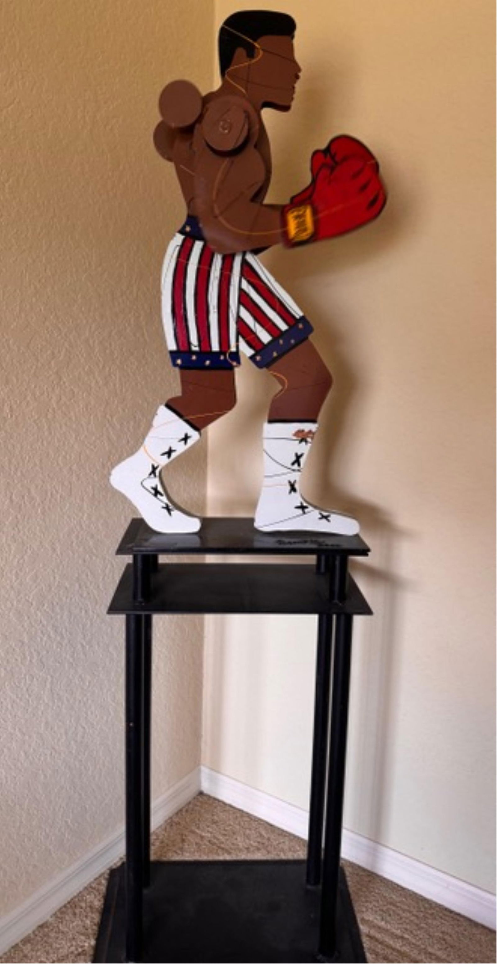 Fredrick Prescott Kinetic Muhammad Ali Sculpture with Base, "Fredrick Prescott signed 2000 Kinetic: Fredrick Prescott Kinetic Muhammad Ali Sculpture with Base, "Fredrick Prescott signed 2000 Kinetic Statue of ""Champ"" Muhammad Aii with iron base. painted metal, Sculpture is 36 inches tall by 17 inc