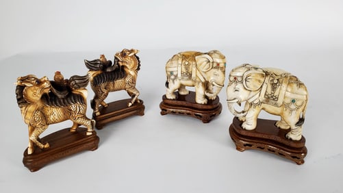 Group of Four Chinese Bone Carvings to include: Pair of Elephants and Pair of Foo Dogs, each on