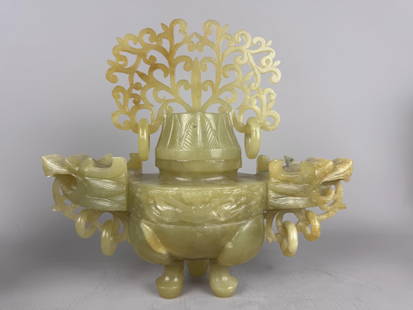 A Chinese Celedon Jade Lidded Koro/Incense Burner pierced finial with Dragon Ring Handles. 10" h.: A Chinese Celedon Jade Lidded Koro/Incense Burner pierced finial with Dragon Ring Handles. 10" h. 11" w. 5" d. Good condition. No blemishes or damage.