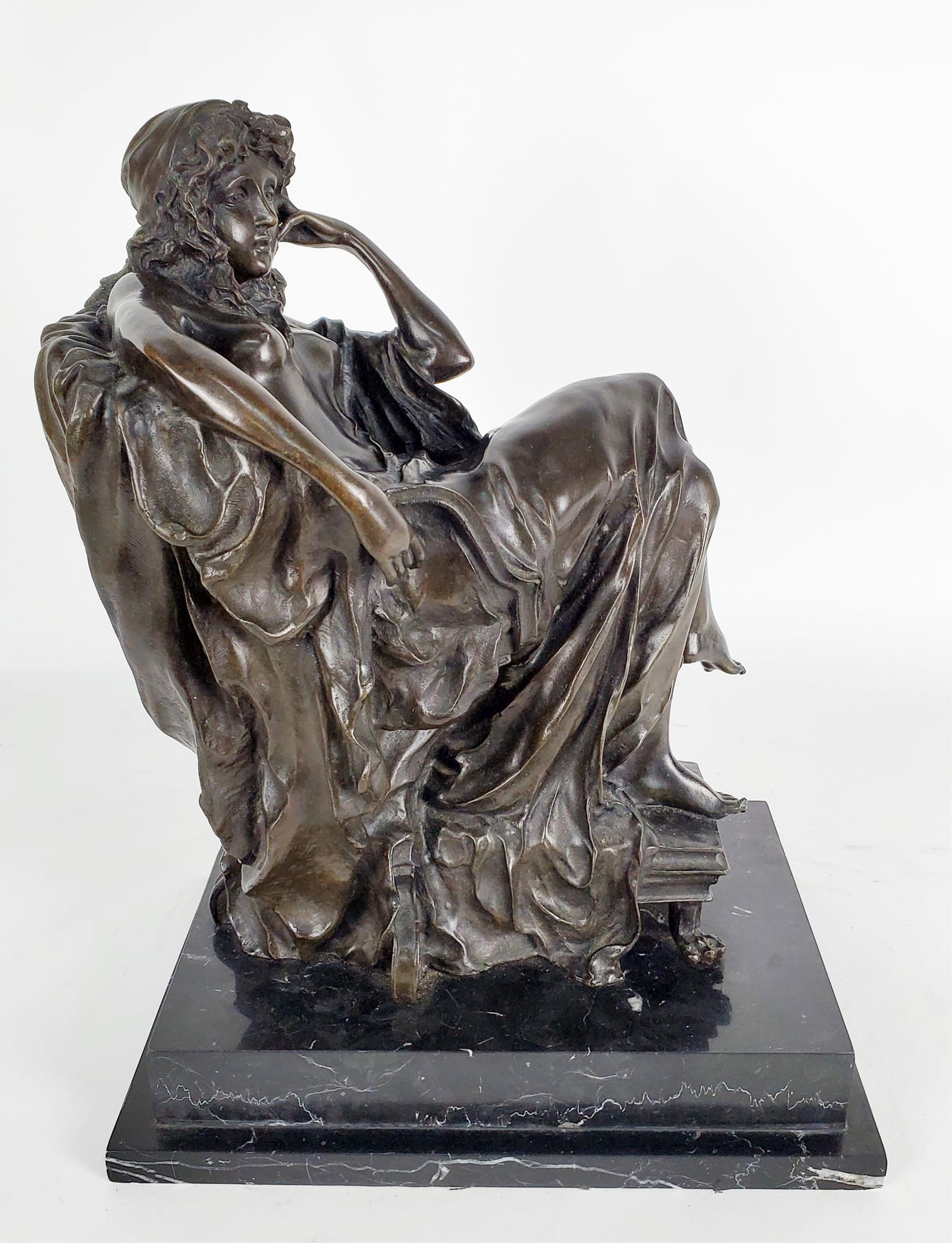 Fine Bronze Patinated Sculpture, After Jean Baptiste Carpeaux (1827-1875) of a Seated Young Nude: Fine Bronze Patinated Sculpture, After Jean Baptiste Carpeaux (1827-1875) of a Seated Young Nude Woman, Signed Bellows in the bronze, mounted on a stone base, Note: This item is heavy.