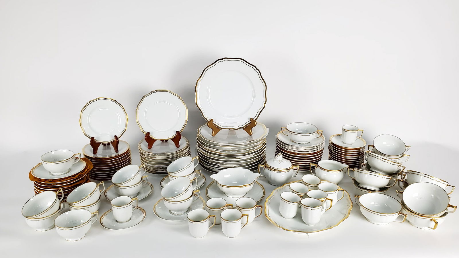 A Limoges Porcelain China Service for 12 by A. Raynaud et Cie., France, white ground with a (1 of 8)