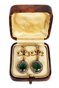 Russian 14kt Gold Emerald and Diamond Earrings, approximately 1.8 ct. Emeralds, stamped 56 with: Russian 14kt Gold Emerald and Diamond Earrings, each cabachon approximately 1.8 ct. of emeralds, stamped 56 with maker's marks, with two ruby points, approximately 1 5/8" L. 5/8" w., in a leatherette