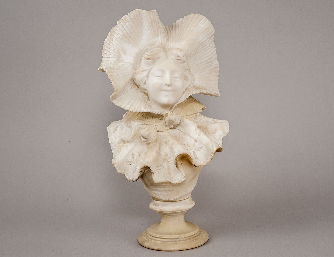 CARVED ALABASTER BUST OF A MAIDEN: Italian. Circa 1900. Wearing a floppy hat with a tied ribbon under the chin. Height 16 5/8". (Cond: minor chips) (700/1000)