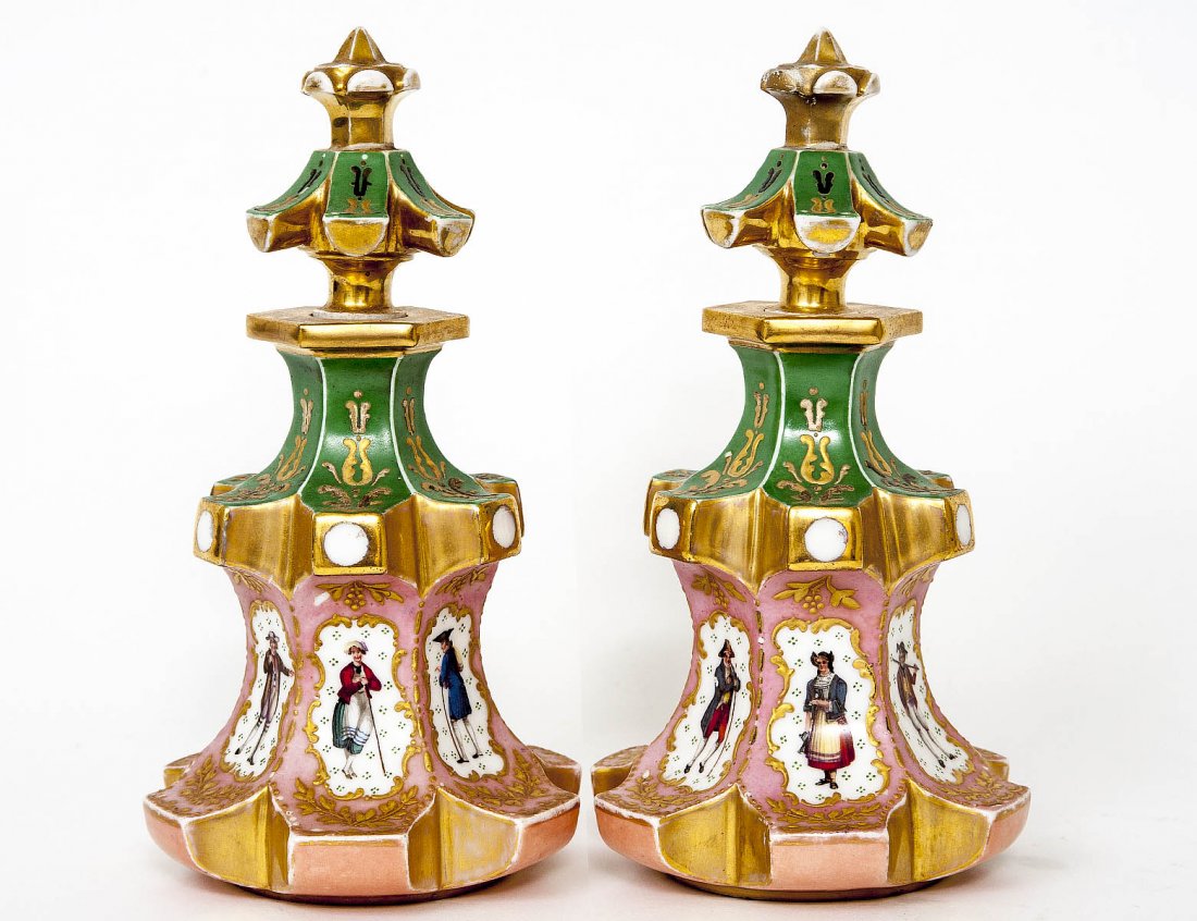 PAIR OF JACOB PETIT PORCELAIN SCENT BOTTLES: French. 19th Century. Each of tree form painted with figural panels. Height 7 7/8". (300/400)
