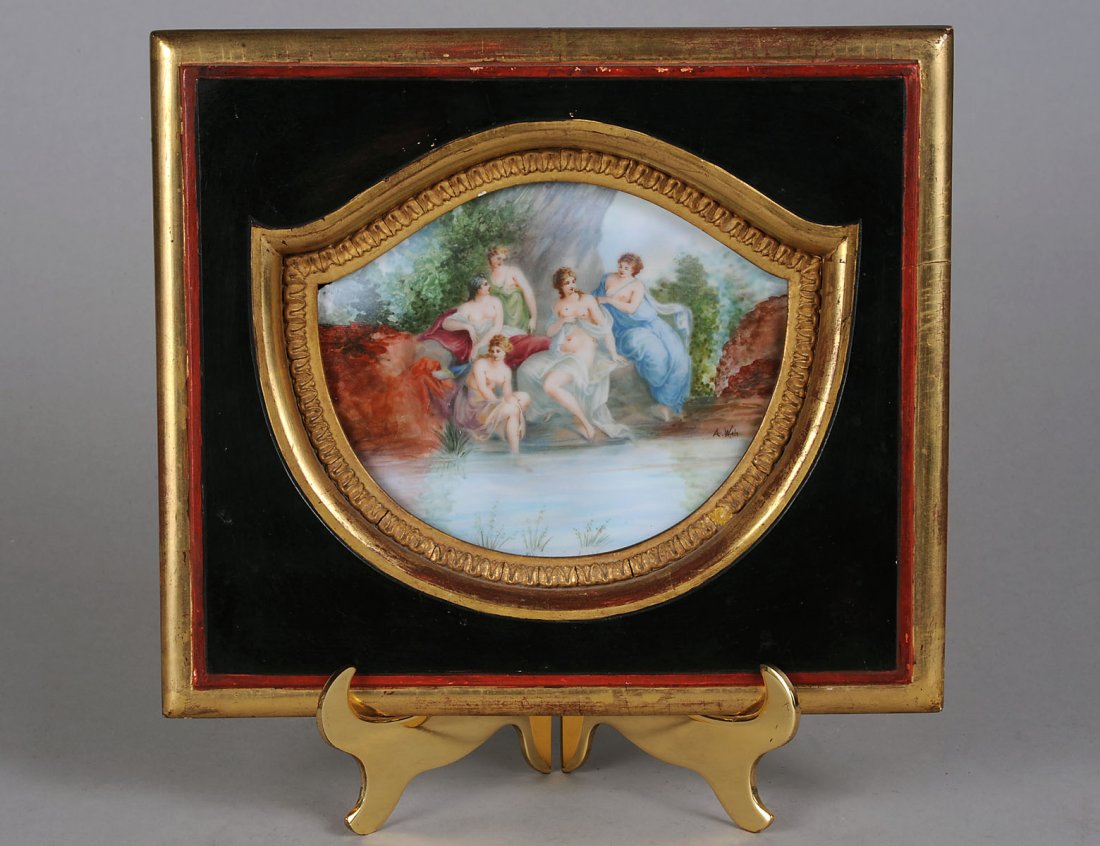 CONTINENTAL PORCELAIN PLAQUE: Probably Austrian. Late 19th Century. Painted by A. Wah. Signed. Depicting five bathers. Measuring 4 ¾” by 6”. In a gilt and ebonized wood frame. (400/500)