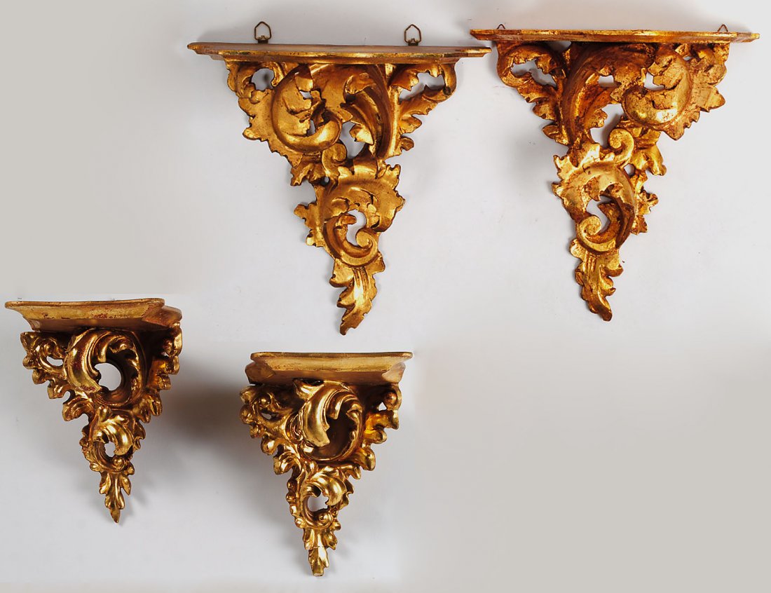 TWO PAIRS OF CARVED AND GILTWOOD BRACKETS: Italian. Each with serpentine fronted top. Heights 11" and 6". (350/550)