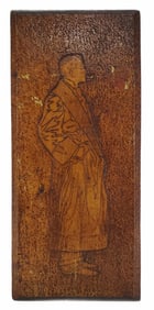 A Wood Carved Panel with a Standing Figure of a Man in Smoking a Pipe with Smoking Jacket, Signed on