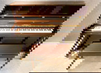 Schiller Upright Piano and Bench, in like new condition, 48" h. 58 1/2" w. 24" d. Note: This lot is