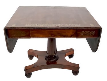 English 19th Century Rosewood Regency Style Sofa Table with brass inlay and the drop leaf top with