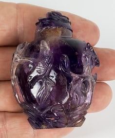 Chinese Amethyst Carved Snuff Bottle, 20th Century, 2" h. 1 13/4" w. 1" d.