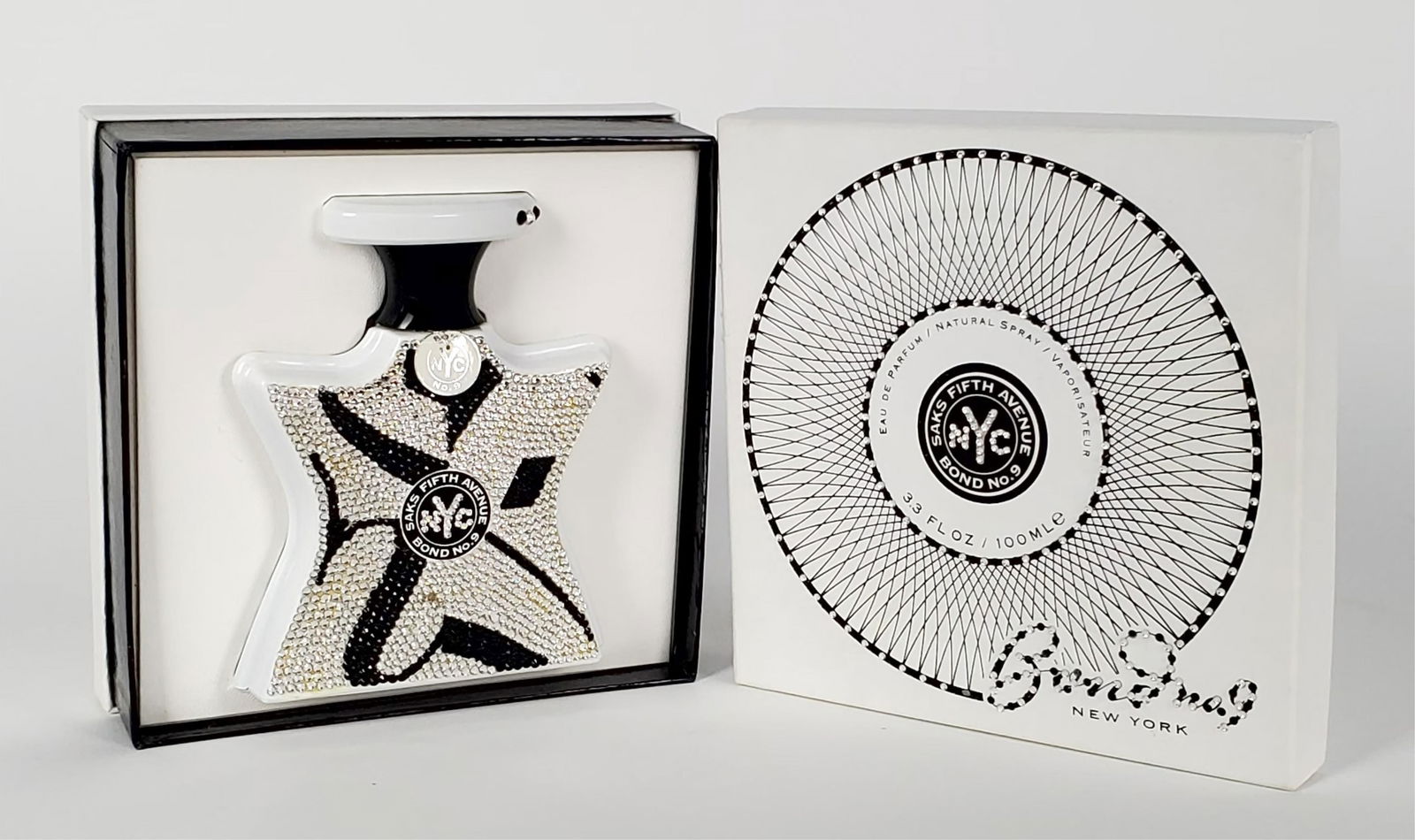 Saks Fifth Avenue Bond No.9 Perfume Bottle, 5 1/4" h. 4" w. (1 of 2)