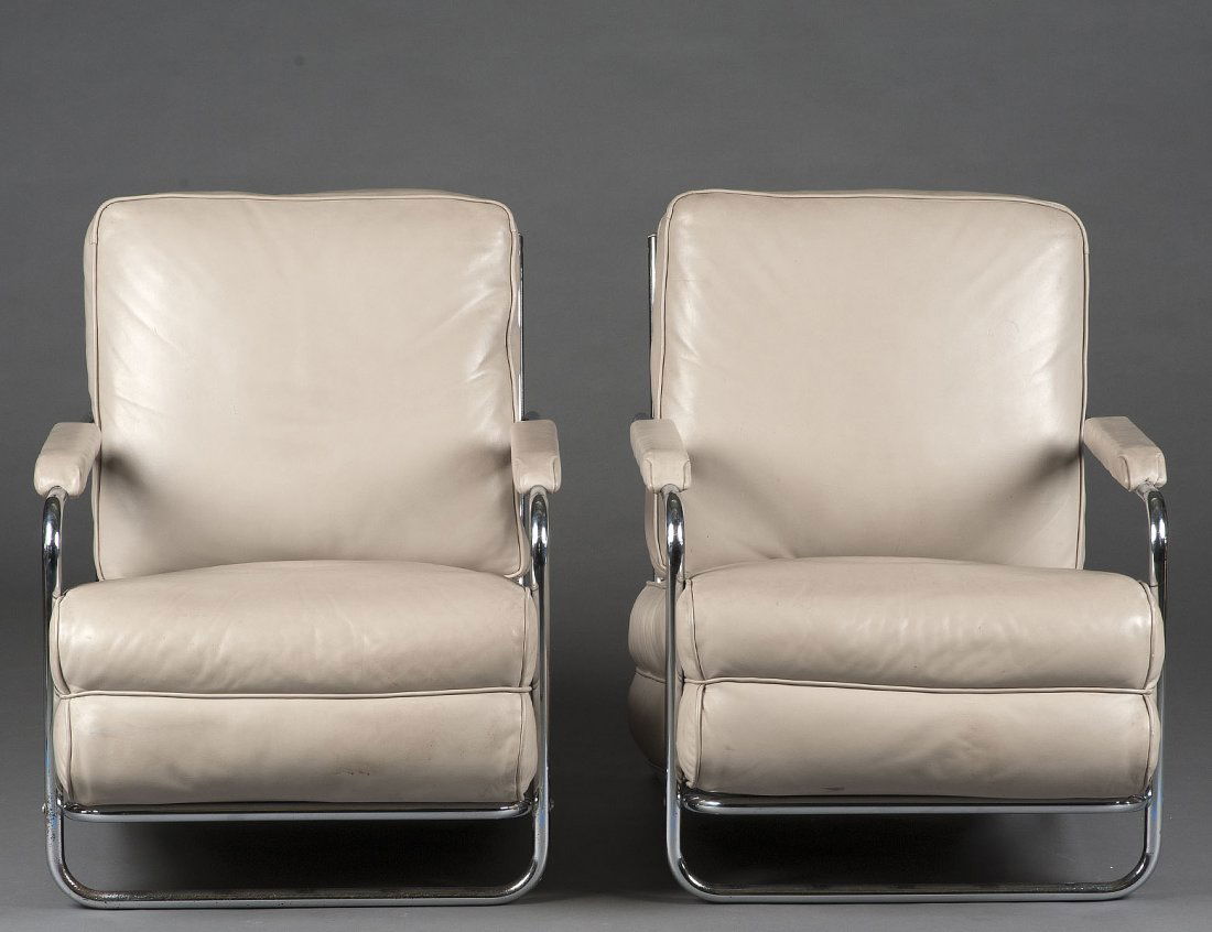 PAIR OF GILBERT RHODE CHROME AND LEATHER ARMCHAIRS: Each with loose seat and back cushion. (1200/1600)