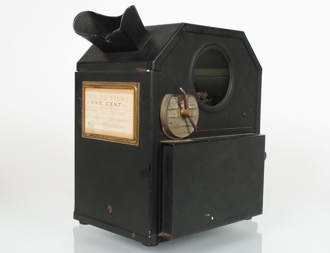 COIN OPERATED METAL CASE STEREO CARD VIEWER: American. First patented Aug. 8, 1916. Height 15". Width 9". Depth 13". (Cond: one glass panel missing, not in working order) (500/700)