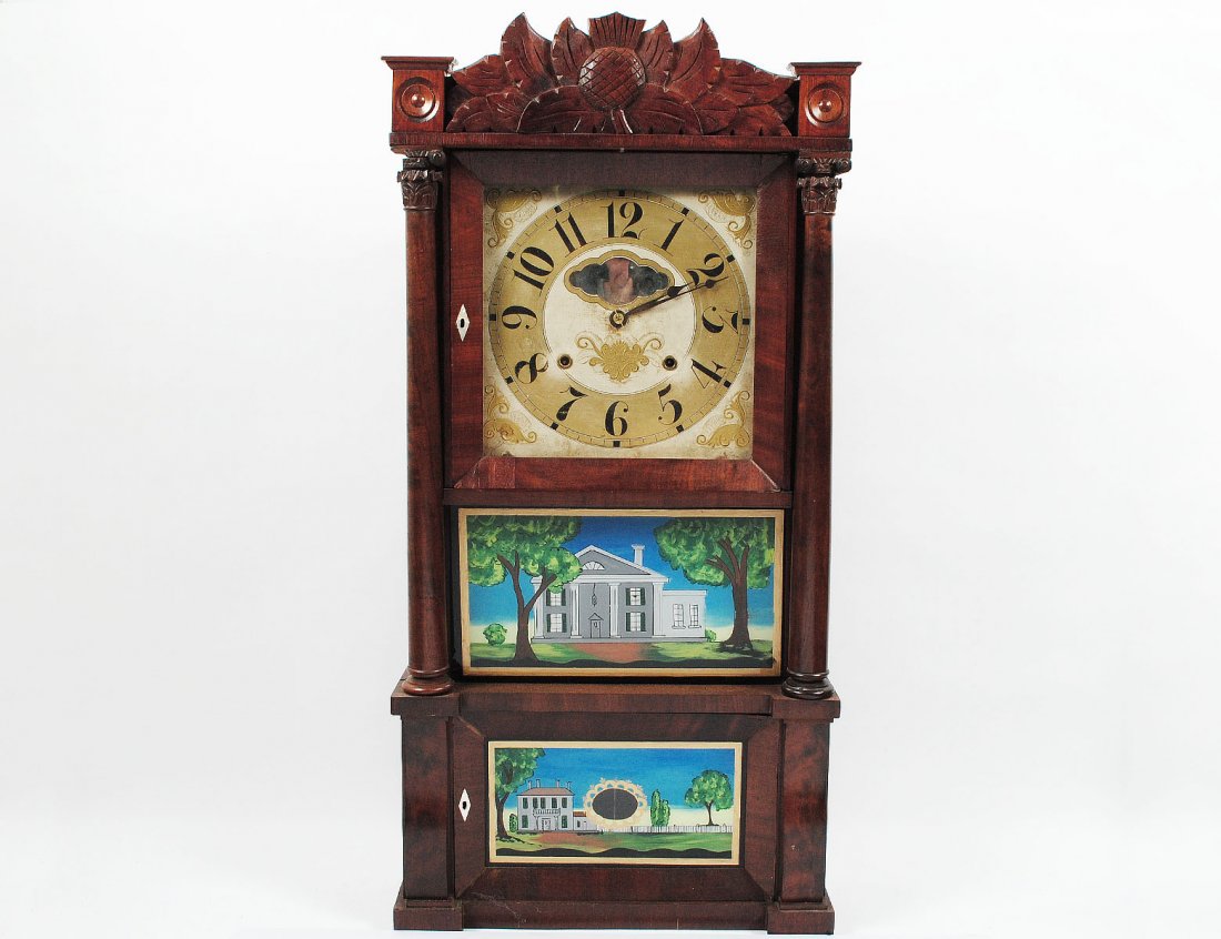 MAHOGANY SHELF CLOCK: American. 19th Century. In the manner of Joseph Ives. With eight day movement and painted dial above two eglomise panels. Height 36 ¼”. (300/400)