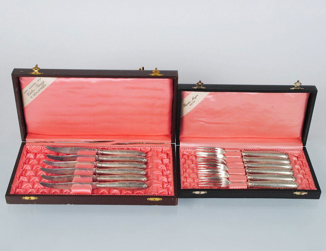 TWELVE PIECE CHRISTOFLE SILVER PLATED FRUIT SERVICE: French. Circa 1900. Comprising: twelve knives and twelve forks. Together with six Continental silver handled fruit knives and forks. (36 pcs) (150/200)