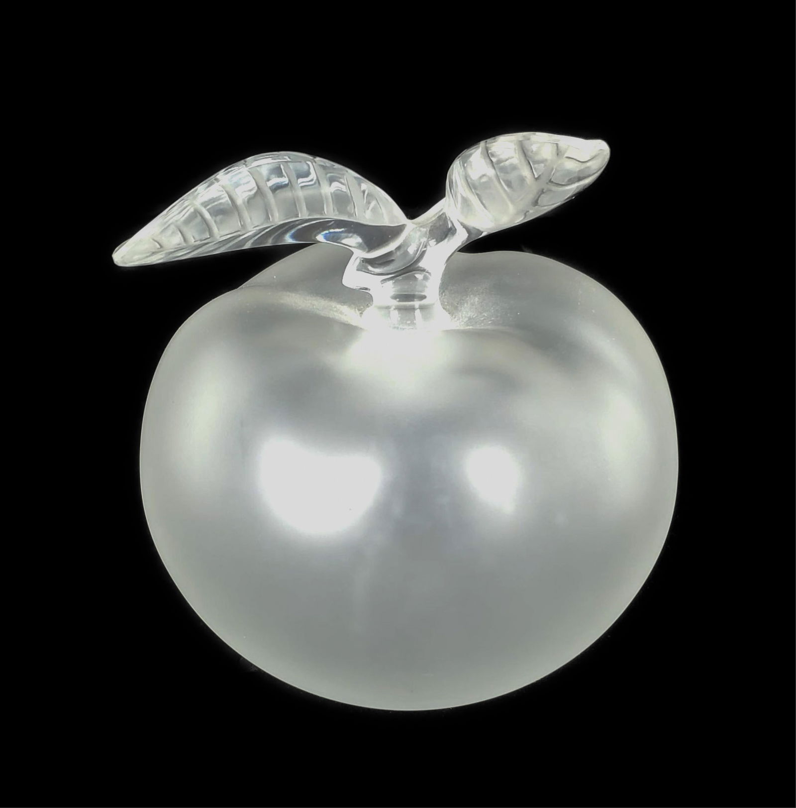 French Lalique Crystal Glass Apple, underside signed Lalique France, 5 1/2" h. 5" w., No chips,: French Lalique Crystal Glass Apple, underside signed Lalique France, 5 1/2" h. 5" w., No chips, blemishes, or imperfections. This item is fragile. Will need proper packaging for shipping.
