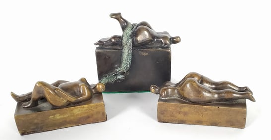 Three Contemporary Bronze Miniature Patinated Sculptures of Sunbathing Figures, all signed Garcon