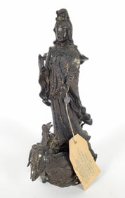 A Thai Bronze Sculpture of Quan-Yin with Dragon, has traces of gilding, with the Thai government
