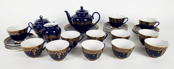 A Russian Cobalt Glazed Porcelain Dessert Service for 12, 20th Century, marked Made in Russia,