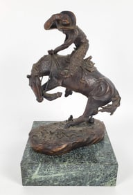 After Frederic Remington Bronze Bronc Buster Sculpture, 20th Century, signed on the base, 9 3/4" h 6