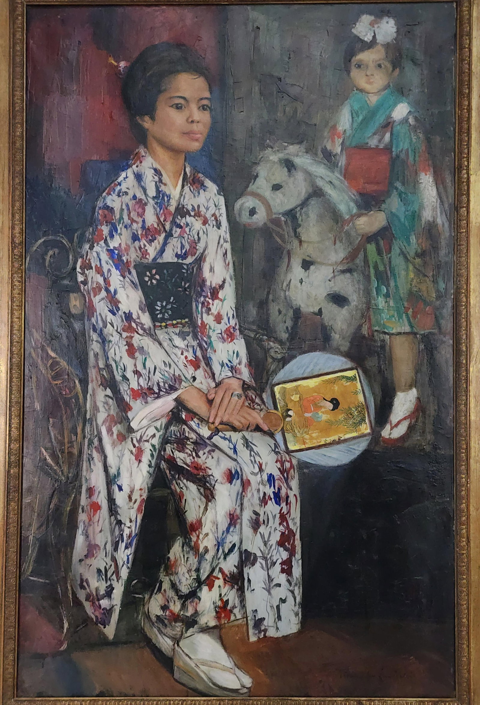Romualdo Battista Federico Locatelli (Italian/Filipino, 1905-1943) Portrait of a Lady Seated in: Romualdo Battista Federico Locatelli (Italian/Filipino, 1905-1943) Portrait of a Lady Seated in Kimono with Fan and Young Child on Toy Horse, Signed Romualdo Locatelli lower right, Oil on canvas, 51" 