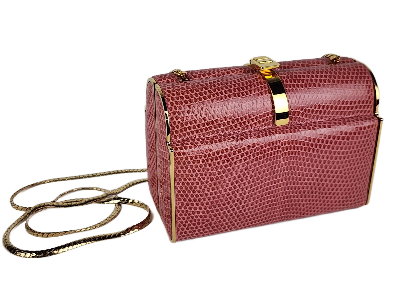 French La Finesse Model Pink Leather Purse/Clutch, Signed, with hidden shoulder strap to convert to: French La Finesse Model Pink Leather Purse/Clutch, Signed, with hidden shoulder strap to convert to purse or clutch, 4 1/2" h. 6" w. 3" d.,