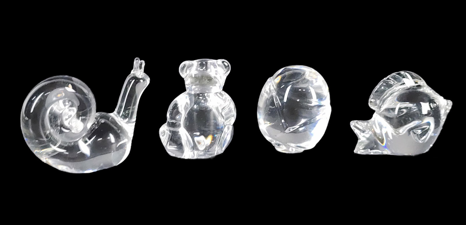 Group of Four Steuben Colorless Glass Figures to include: Owl, Bear, Snail, Fish, all marked (1 of 2)
