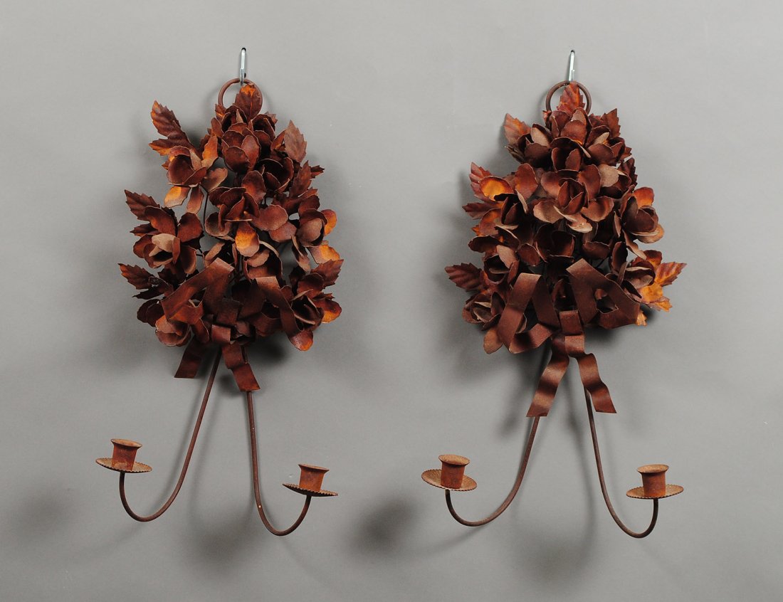 PAIR OF METAL TWO LIGHT SCONCES: Each with foliate and ribbon backplate. Height 18". (100/500)