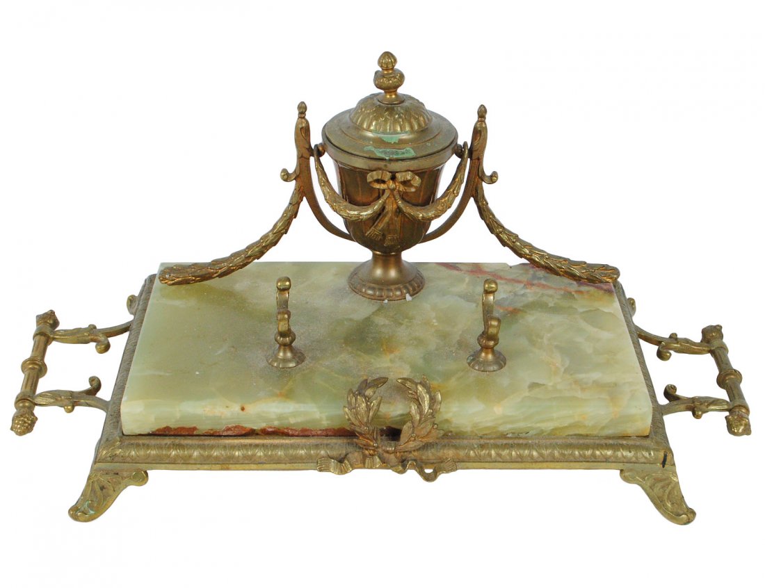 EMPIRE STYLE GILT BRONZE AND ONYX DESK STAND: European. Circa 1925. With inkwell and pen holders. Length 13 1/2". (100/500)