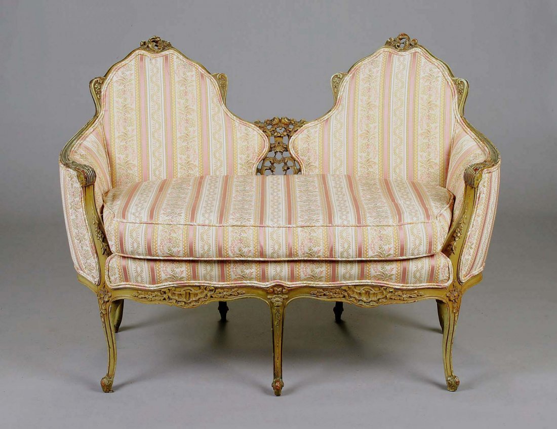 ROCOCO STYLE PAINTED LOVESEAT: Italian. With double chair back continuing to form arms above the seat with loose cushion, raised on cabriole legs. Length 46 1/2". (100/500)