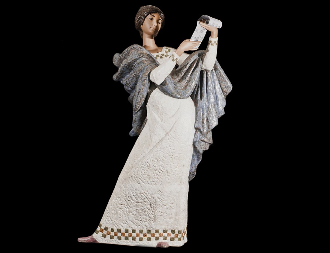LLADRO PORCELAIN FIGURE OF A SINGER: Spanish. The young maiden wearing a long dress and shawl and holding a music sheet. Height 35". (100/500)