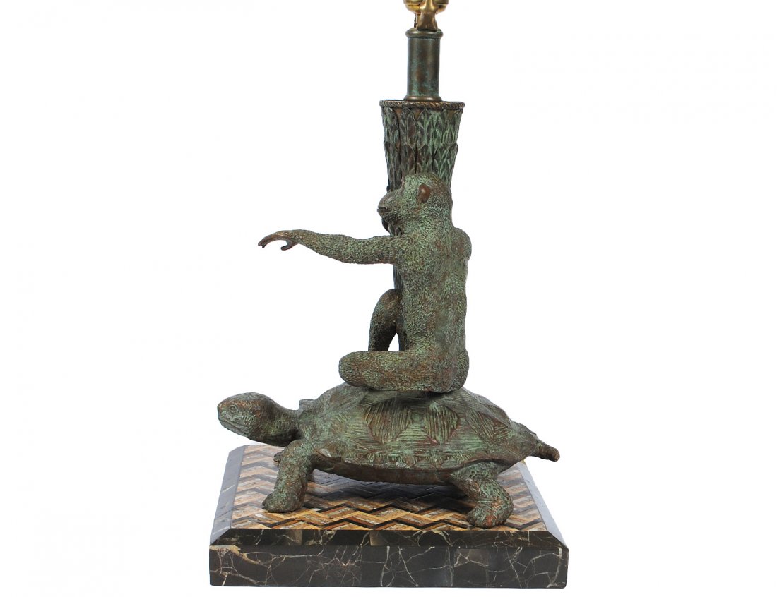 BRONZE FIGURAL LAMP: Cast as a monkey and a turtle with verdigris patina, mounted on a marble tiled base. Height 17 1/2". (100/500)