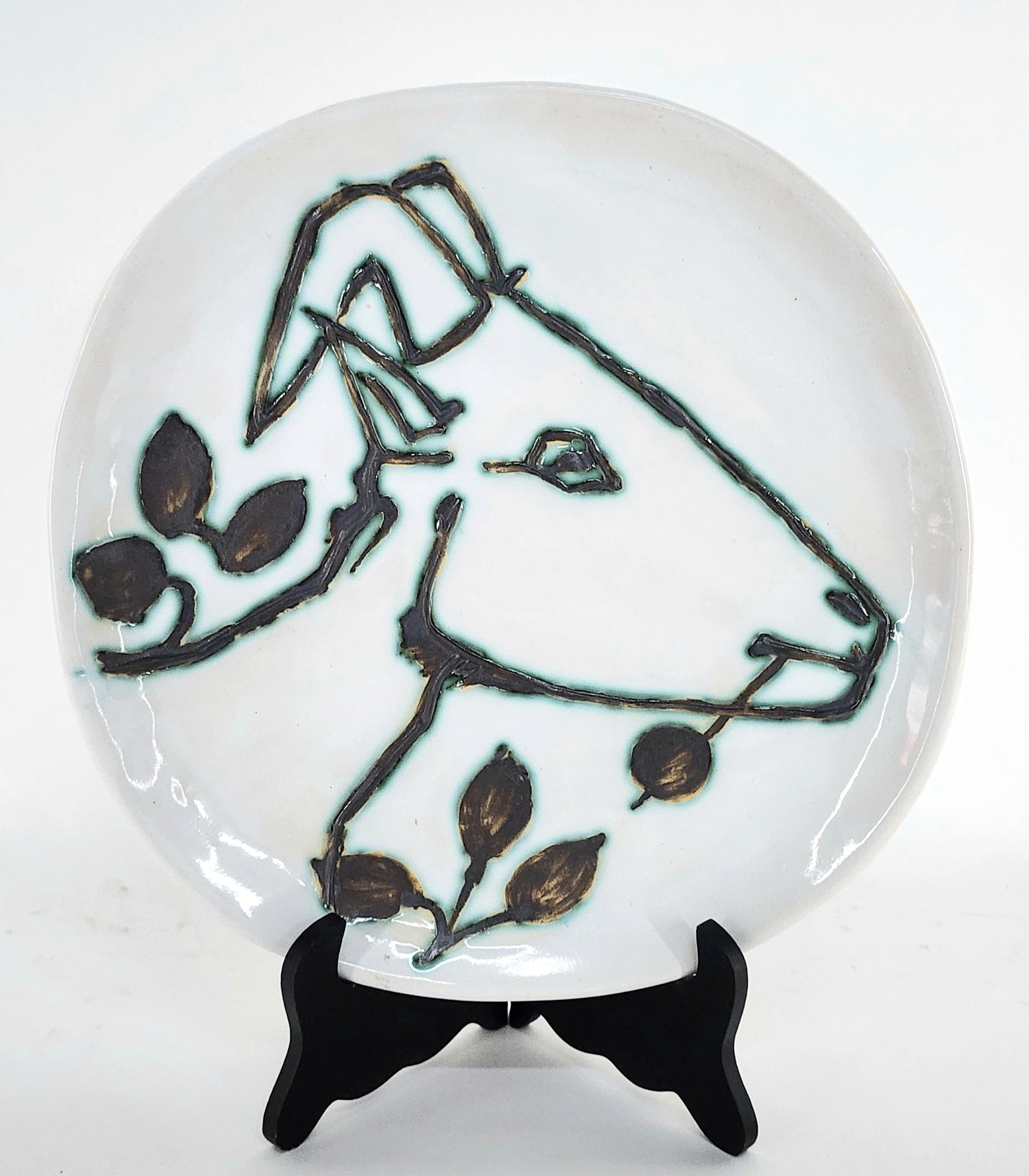 Pablo Picasso (Spanish, 1881-1973) Tete de Chevre Profil, Madoura Ceramic Plate, back with impressed: Pablo Picasso (Spanish, 1881-1973) Tete de Chevre Profil, Madoura Ceramic Plate, back with impressed mark, 93/4" dia.