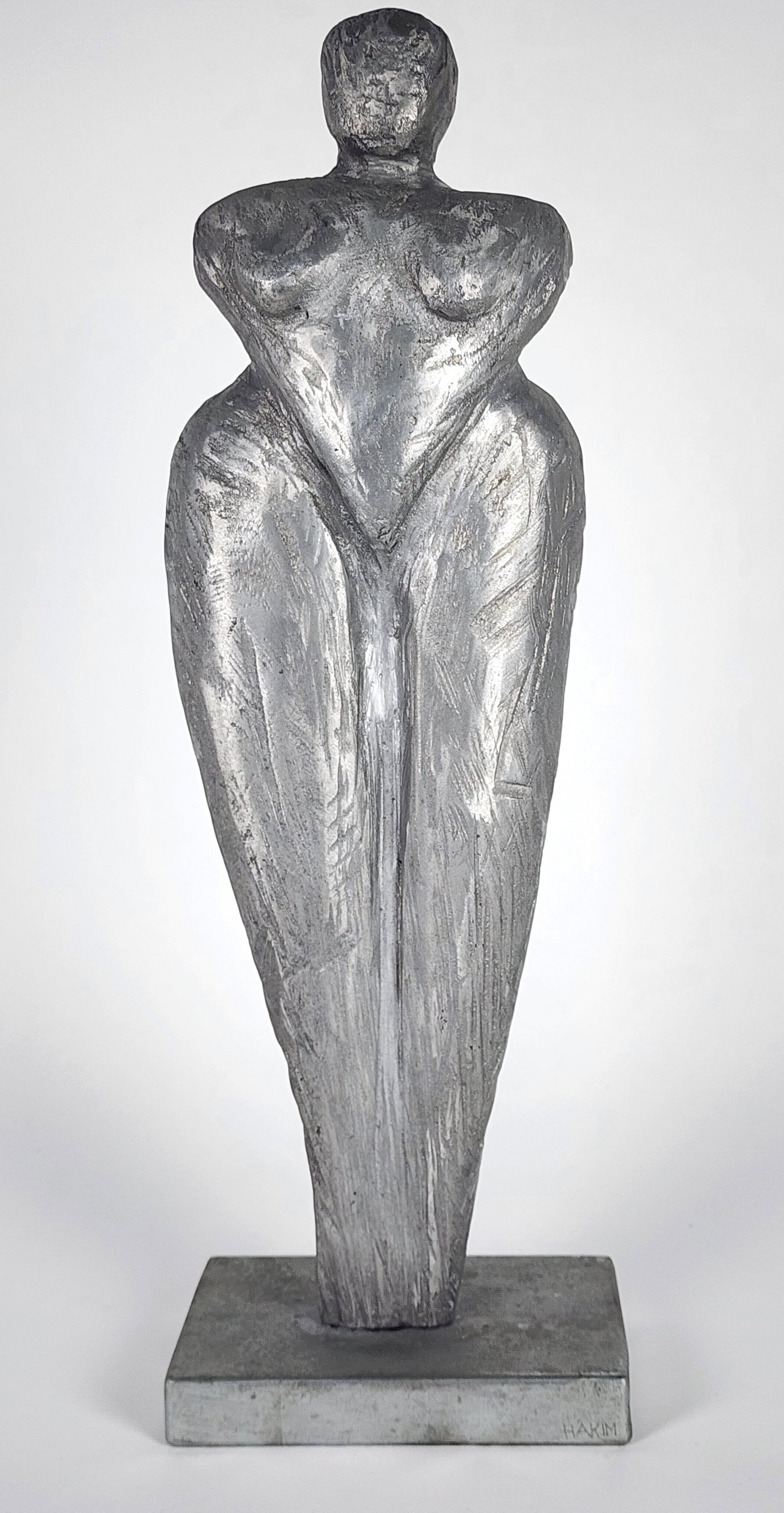Contemporary Aluminum Figurative Sculpture, Signed Hakim on the base, 21 1/2" h. 7" w., possibly the: Contemporary Aluminum Figurative Sculpture, Signed Hakim on the base, 21 1/2" h. 7" w., possibly the Lebanese sculptor Maroun Hakim (b. 1950) .