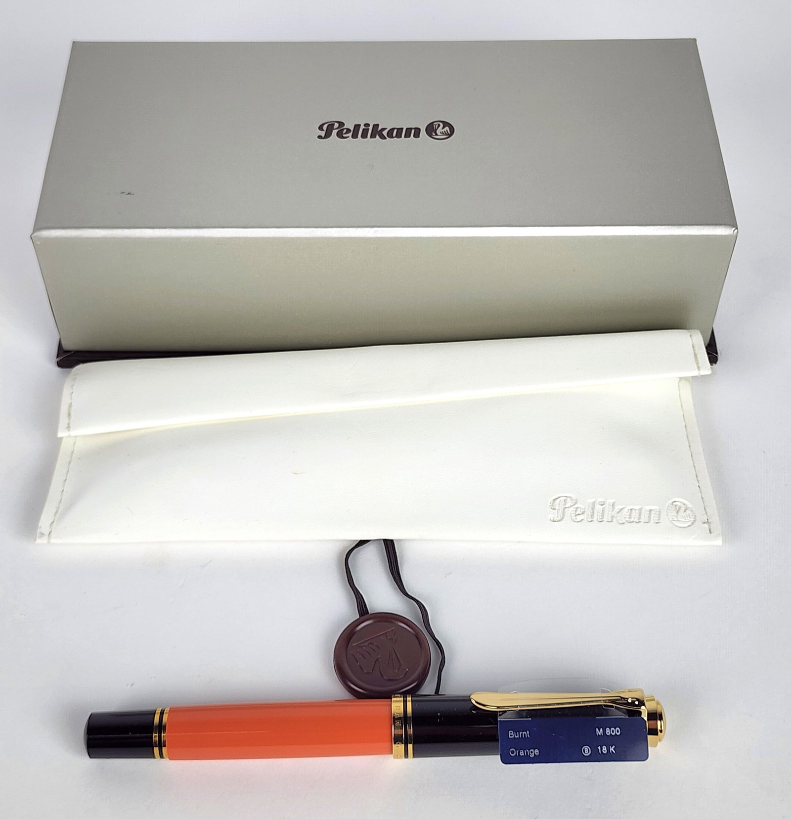 A Pelikan M800 Burnt Orange Fountain Pen with 18K gold plated nib with presentation box. (1 of 5)