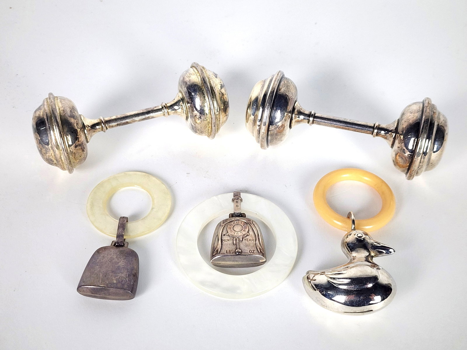 Five Pieces Victorian Children's Objects to include: Pair of Rattles and Three Teething Rings, (1 of 5)